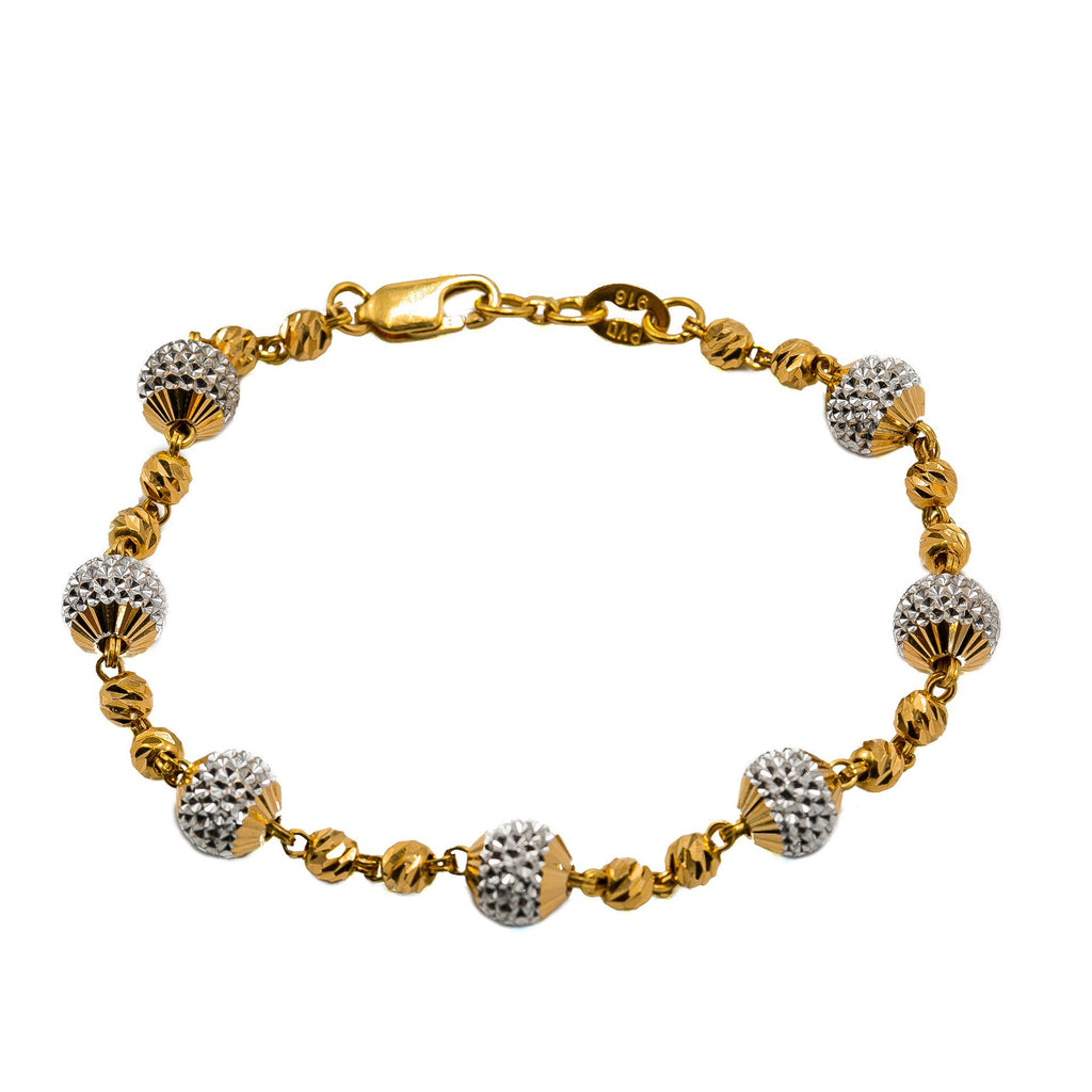 22K Multi Tone Gold Bracelet W/ Multi Tone Spindle Beads | Add a unique touch of gold to your look with this 22K multi tone gold women’s bracelet from Viran...