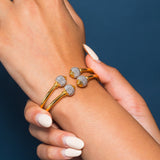 22K Multi Tone Gold Bangle W/ Split Stacked Band & White Gold Accent Balls | Create bold accents with radiant blends of gold colors and unique jewelry designs such as this 22...