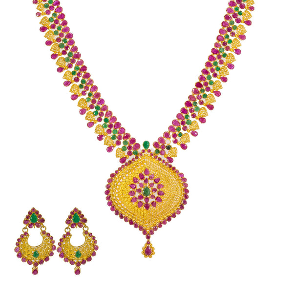 22K Yellow Gold Long Necklace & Chandbali Earrings Set W/ Rubies & Emeralds | 


Boldly stand out with the radiance of color, design and luxury with this most elaborate 22K ye...