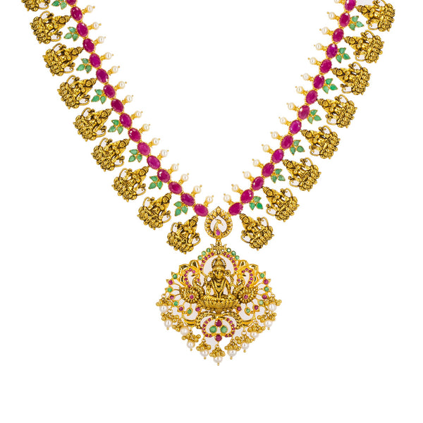 22K Yellow Antique Gold Long Laxmi Necklace & Earrings Set W/ Rubies, Emeralds & Pearls | 


The beauty of tradition is best presented in the midst of fine gold and precious gemstones lik...