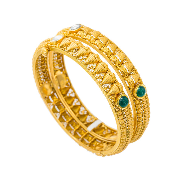 22K Yellow Antique Gold Domed Bangles Set of 2 W/ Kundan & Emeralds | Enjoy the exquisite blend of radiant gold with Kundan and emeralds wrapped in seamless design wit...