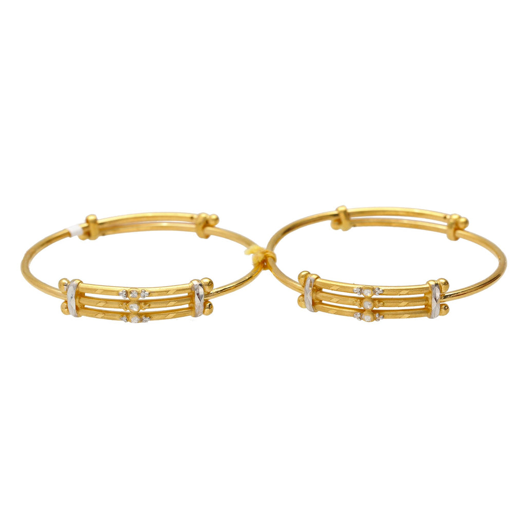 22K Yellow & White Gold Fenced Baby Bangles | 
Get your little one something they can cherish forever. These charming little 22k gold bangles w...