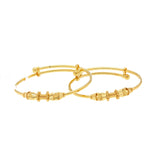 22K Yellow Gold Delightful Baby Bangle Set | 
Bless your little one with our gorgeous 22K Yellow Gold Beaded Sphere Bangle Set These Indian go...