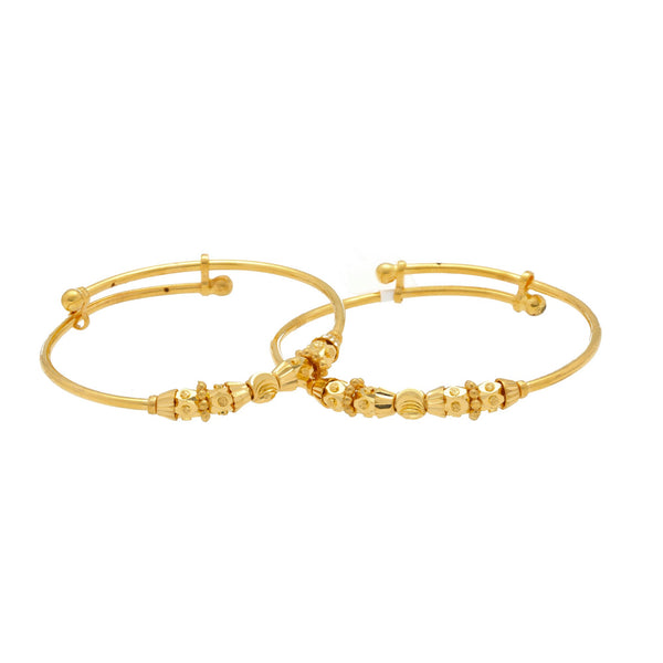 An image of two Angelic 22K gold bangles from Virani Jewelers | Express the love you have for your child with the Angelic 22K gold baby bangles from Virani Jewel...