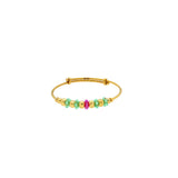 An image of a single 22K gold bangle with emerald and ruby bead embellishments and an adjustable band from Virani Jewelers. | Add color to your child’s wardrobe with these beautiful 22K gold bangles from Virani Jewelers!

D...