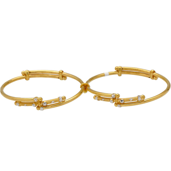 22K Yellow Gold Adjustble Baby Bangles w/ White Gold Accents | 
Keep it cute and simple with these 22k gold bangles for babies. The adorable white gold accents ...
