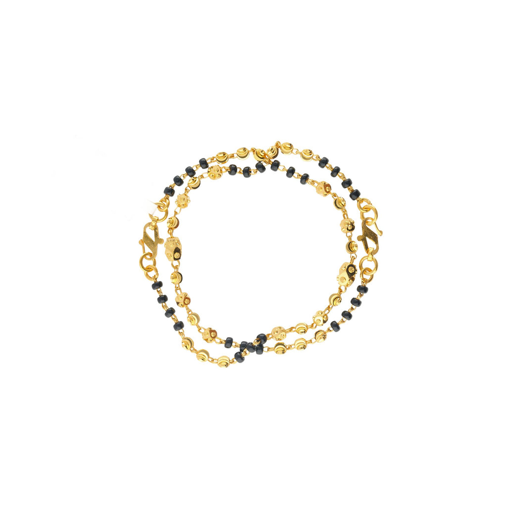 An image of the Riley 22K gold bracelet with gold and black beads from Virani Jewelers. | Help your child feel as fabulous as you do with the Riley 22K gold bracelets from Virani Jewelers...