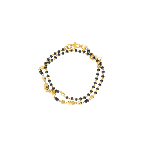 An image of the Kendall 22K gold bracelet with black beads from Virani Jewelers! | Let your child show off their sense of fashion with the Kendall 22K gold baby bracelets from Vira...