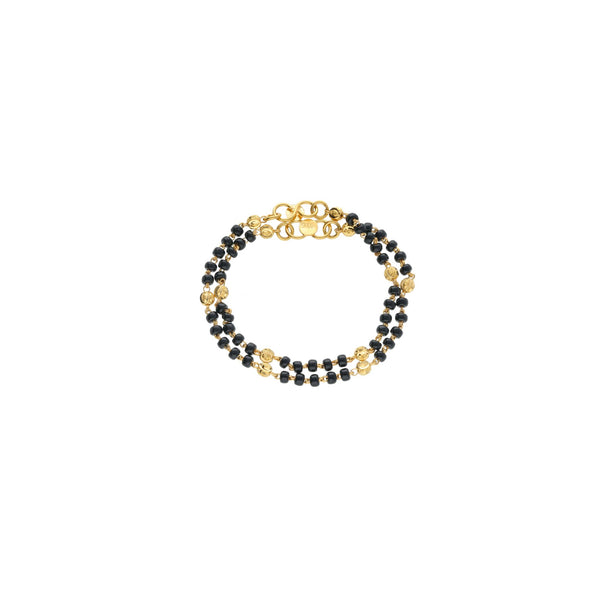 22K Yellow Gold Baby Bracelet W/ Gold Balls & Black Beads | 



Select precious gifts of fine gold to adorn your kids like this 22K yellow gold baby bracelet...