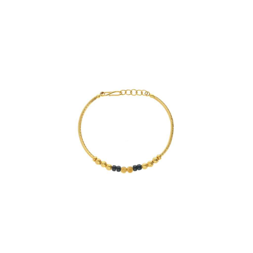 An image showing the beading and chain on the 22K gold bracelet for children from Virani Jewelers. | Enjoy the simple, yet elegant design of this 22K gold bracelet from Virani Jewelers.

Perfect for...