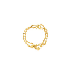 An image of the 22K gold bracelet with varying sized gold balls from Virani Jewelers.