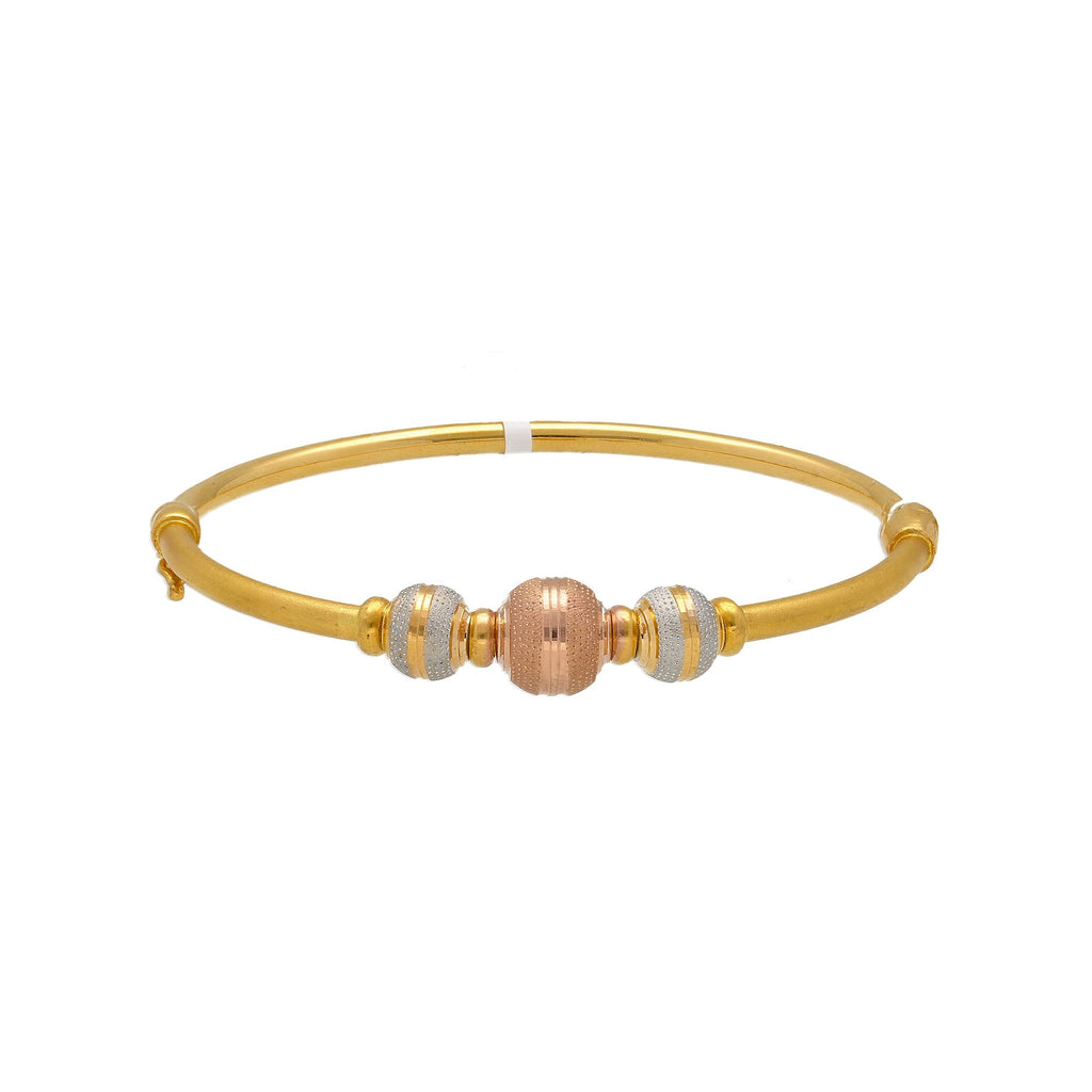 22K Multi Tone Gold Bangle W/ Stripe-Textured Accents Balls | 


Add a hint of texture and color with the versatile designs of this elegant 22K tri-tone gold b...