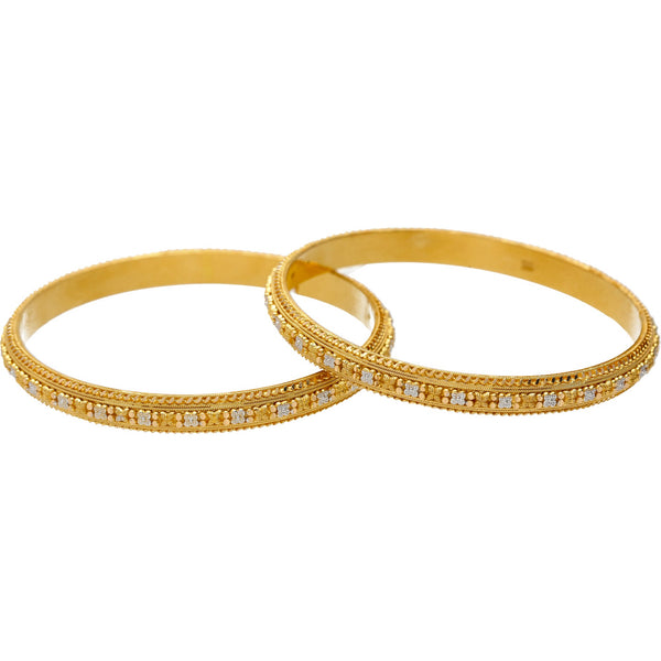 22K Multi-Tone Gold Beaded Filigree Bangle Set of 2 | 
These two stunning Indian gold bangles look great with both casual outfits and formal looks. The...