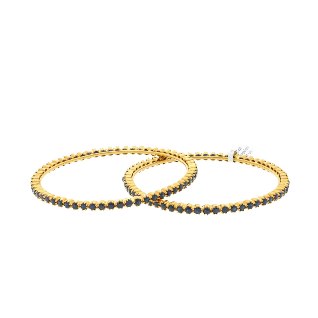 22K Yellow Gold Bangles Set of Two W/ Sapphire, 38.4 grams | 


Supporting an interesting mix of modern and traditional style, these 22K yellow gold bangles w...