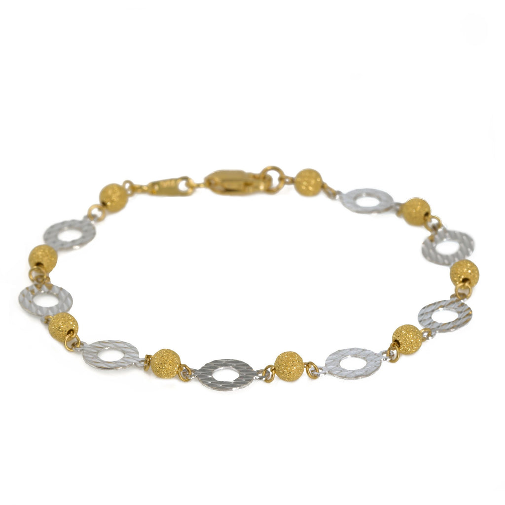 22K Multi Tone Gold Bracelet W/ White Gold Discs & Glass Blast Beads | Add a bit of feminine flare to your everyday looks with this 22K multi tone gold women’s bracelet...