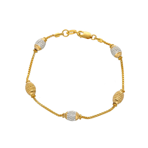 22K Multi Tone Gold Bracelet W/ Boxlink Chain & Gold Accent Oblong Beads, 7.2 Grams | 


Explore the unique designs of this 22K multi tone gold bracelet from Virani Jewelers!   Featur...