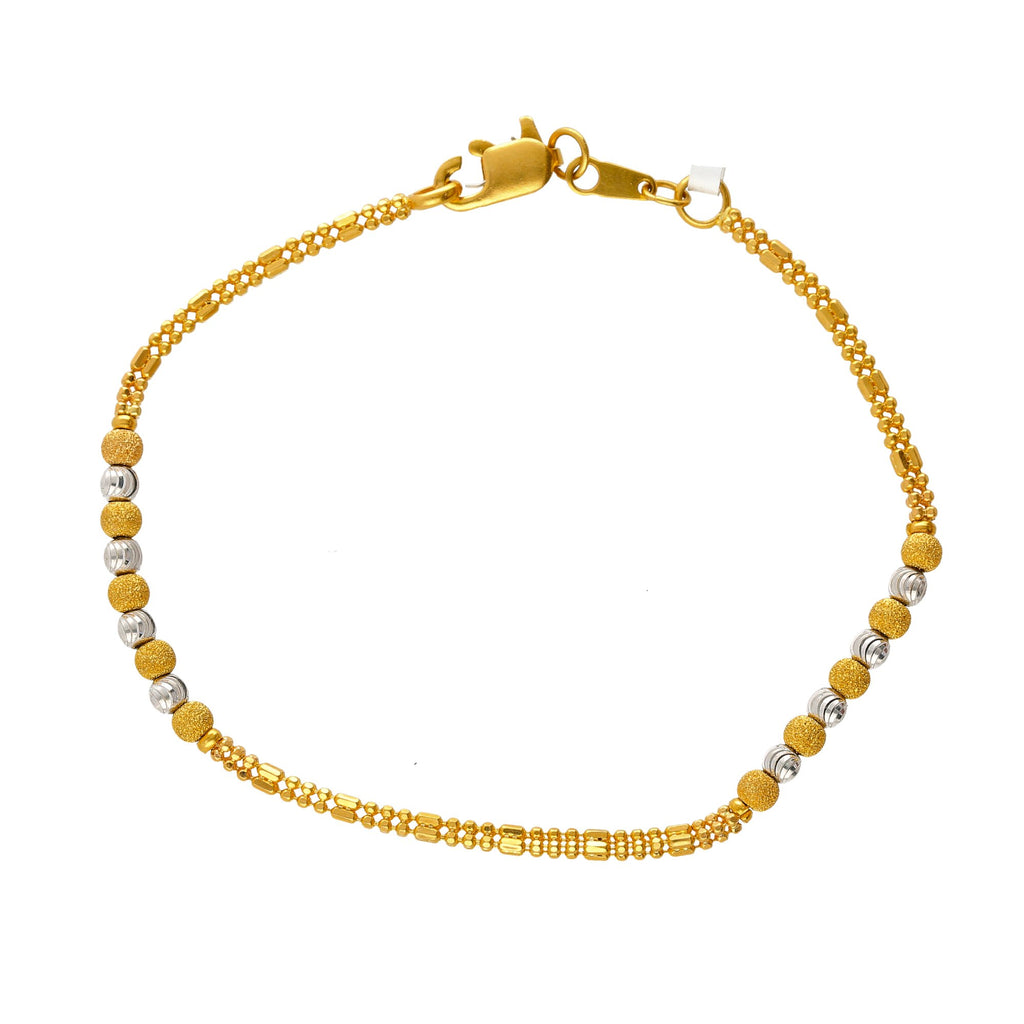 22K Yellow & White Gold Half Beaded Bracelet | 
Our 22K Yellow & White Gold Half Beaded Bracelet is just what your wrist needs to shimmer on...