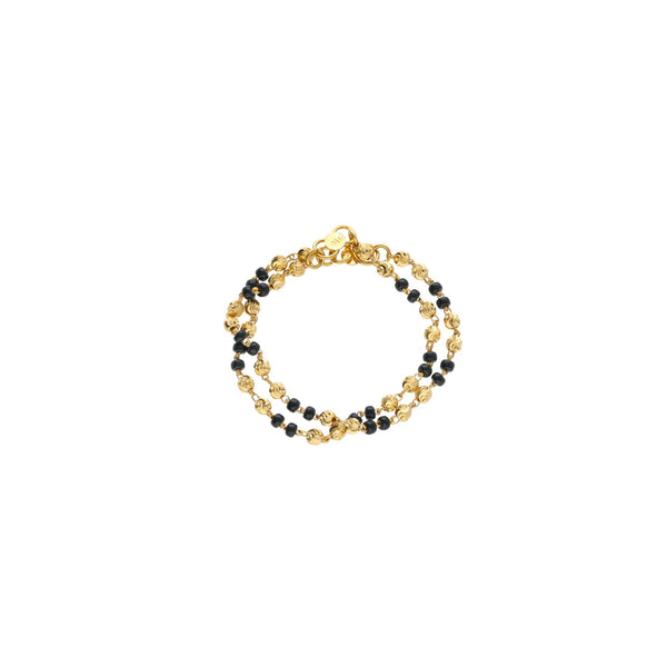 22K Yellow Gold Baby Bracelets Set of 2 W/ Swirl-Gold Balls & Black Beads, 7.2 grams | 



It is never too early to introduce your kids to the brilliance of fine 22K gold jewelry like ...