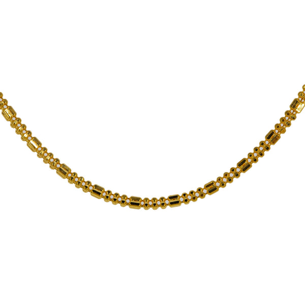 A closup image of the capsule and ball beads on the 22K gold chain from Virani. | Take any outfit to the next level with a 22K gold chain from Virani Jewelers!
 

Made with flawle...