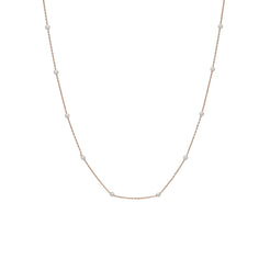 An image of a 22K rose gold chain with white gold ball accents from Virani Jewelers.