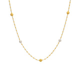 An image of a white and yellow 22K gold necklace with bead accents from Virani Jewelers. | Find the perfect way to accent your ensemble with this 22K gold necklace from Virani Jewelers!

F...