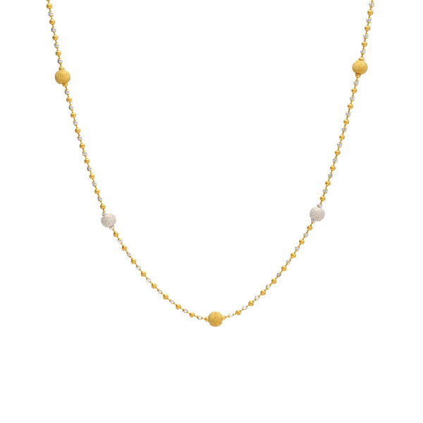 An image of a white and yellow 22K gold necklace with bead accents from Virani Jewelers. | Find the perfect way to accent your ensemble with this 22K gold necklace from Virani Jewelers!

F...