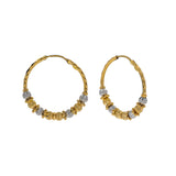 22K Multi Tone Gold Hoop Earrings W/ Gold Chiseled Bicone Beads | 


Enjoy the lavish looks of textured design crafted into fine gold with jewelry like this pair o...