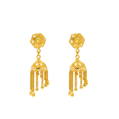 An image of a pair of Jhumki style 22K gold earrings from Virani Jewelers with a flower design and spiral filigree.
