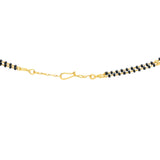 An image of the closure on a 22K gold necklace from Virani Jewelers | Add brilliant golden jewelry to your attire with this 22K yellow gold necklace from Virani Jewele...