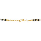 An image of the closure on a double stranded gold Indian necklace from Virani Jewelers | Searching for gorgeous jewelry to add to your wardrobe? Look no further than this sophisticated 2...