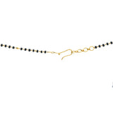 A close-up image of the closure on a 22K gold Indian necklace crafted by Virani Jewelers | Add beauty to your wardrobe with this 22K yellow gold necklace from Virani Jewelers!

Radiant 22K...