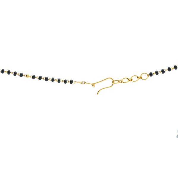 A close-up image of the closure on a 22K gold Indian necklace crafted by Virani Jewelers | Add beauty to your wardrobe with this 22K yellow gold necklace from Virani Jewelers!

Radiant 22K...