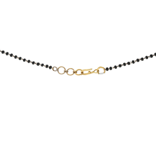 The 22K Gold Devya Mangalsutra Chain Necklace | 


Show off your cultural pride with The 22K Gold Devya Mangalsutra Chain Necklace. The black bea...