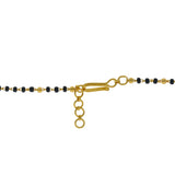 An image of the hook-in-eye clasp on a 22K gold necklace with black beads from Virani Jewelers | Add an elegant luster to your attire with this 22K gold Mangalsutra Chain from Virani Jewelers!

...