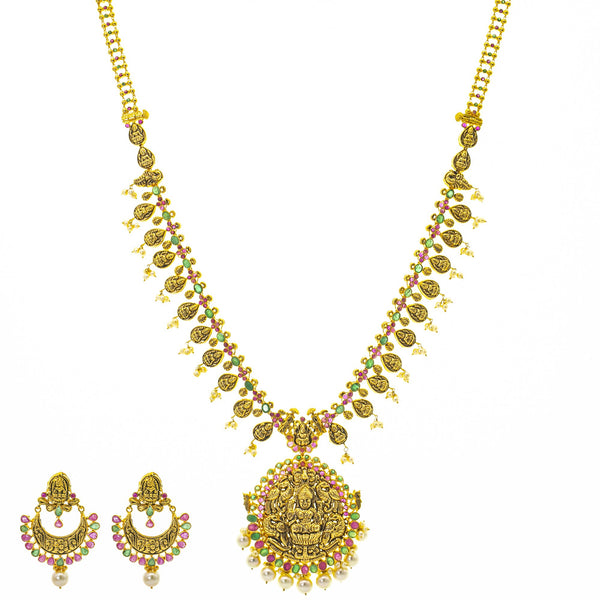 An image of the Anvi Antique Laxmi 22K gold necklace set from Virani Jewelers. | Show off your style and culture on special occasions with this stunning 22K gold necklace set fro...