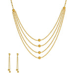 An image of a beautiful Indian jewelry set featuring a necklace and earrings from Virani Jewelers | Use this 22K yellow gold necklace and earring set from Virani Jewelers to add lustrous elegance t...