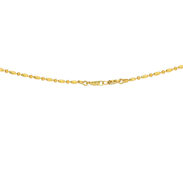 An image of the clasp on a beautiful Indian necklace from Virani Jewelers | Use this 22K yellow gold necklace and earring set from Virani Jewelers to add lustrous elegance t...