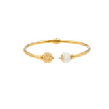 An image of a 22K gold bangle with contrasting white and yellow gold beads at the ends from Virani Jewelers. | Complete your look with this gorgeous 22K gold bracelet from Virani Jewelers!

Featuring yellow a...