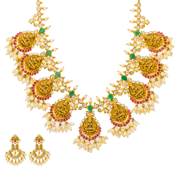 22K Yellow Gold Guttapusalu Necklace & Earrings Set W/ Rubies, Emeralds, CZ Gems, Pearls & Laxmi Accents | Stand out with elegance in the 22K yellow gold Guttapusalu necklace and earrings set from Virani ...