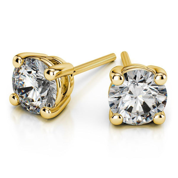 14k Yellow or White Gold Round Cut Diamond Solitaire Earrings (1-1/4 ct.) | A beautiful pair of Solitaire Diamond Studs. Total weight of 1.25 ct.
Price given based on VS cla...