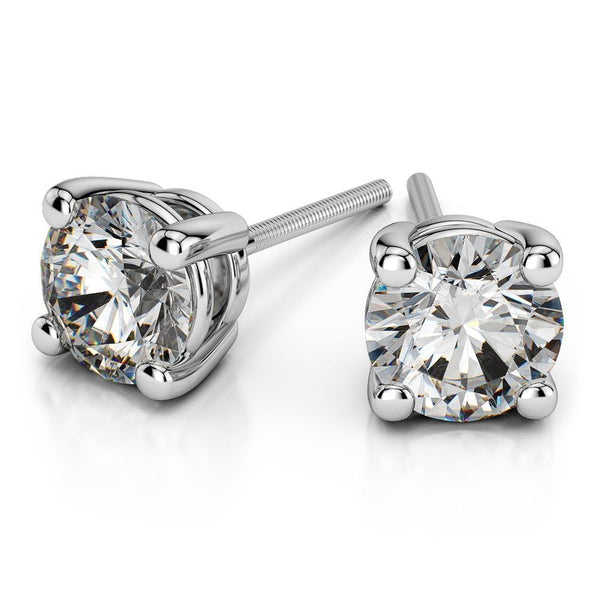 14k White Gold Round Cut Diamond Solitaire Earrings | A beautiful pair of Solitare Diamond Studs. Total weight of 0.75 ct.



Price based on VS clarit...