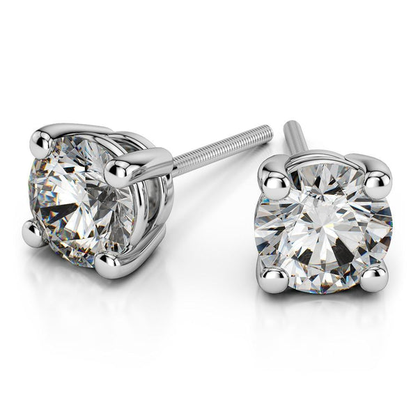 14k White Gold Round Cut Diamond Solitaire Earrings | A beautiful pair of Solitaire Diamond Studs. Total weight of 1.0 ct.



Price given based on VS ...