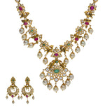 22K Yellow Antique Gold Necklace & Chandbali Earrings Set W/ Emeralds, Rubies, Pachi CZ & Hanging Pearls | 


Illuminate in the illustrious designs of fine jewelry pieces like this decorated 22K yellow an...