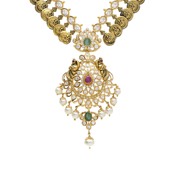 22K Yellow Antique Gold Necklace & Chandbali Earrings Set W/ Laxmi Kasu, Pachi CZ, Emeralds, Rubies & Pearls | 


Behold the sacred beauty and unique details of culture as design with this 22K yellow gold ant...