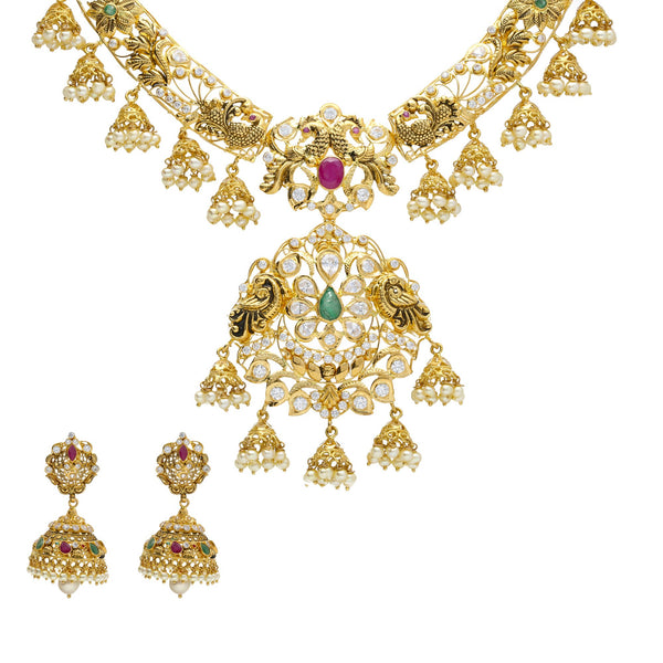 22K Yellow Antique Gold Necklace & Jhumki Earrings Set W/ Pachi CZ, Rubies, Emeralds, Pearls & Peacocks Accents | 


Create statements with accents of antique gold and embellishments of precious gemstones like t...