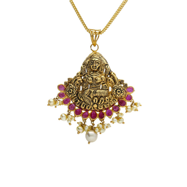 22K Yellow Antique Gold Laxmi Pendant W/ Underlining Rubies & Pearls | 


Make a big statement with a small piece of significant jewelry with this precious 22K yellow a...