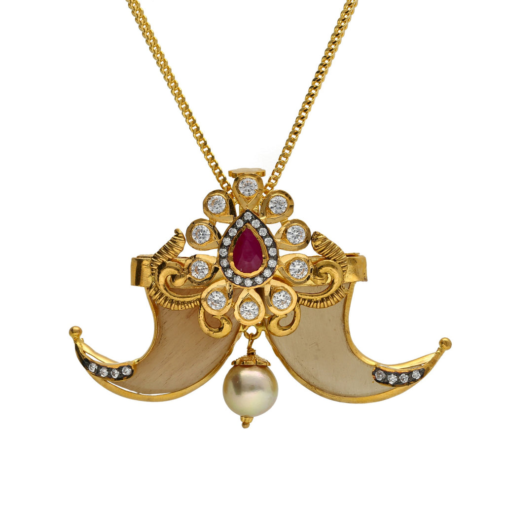 22K Yellow Gold Tiger Nail Pendant W/ CZ, Pearls & Pear Shaped Center Ruby | 


The distinct designs of traditional and cultural symbols are a great accent of fine jewelry li...