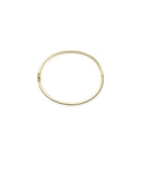 14K Yellow Gold Diamond Bangle W/ 0.47ct Bezel Set & Clustered Diamonds | Indulge in the guilt-free exploration of precious diamonds and gold of this exquisite women’s 14K...