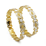 22K Two Tone Gold XO Bangles, Set of 2 | 22K Two Tone Gold XO Bangles, Set of 2 for women. Bangle frame features a yellow and white gold X...