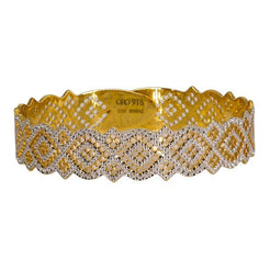 One 22K multi-tone bangle featuring white and gold polka designs and expert attention to detail.
